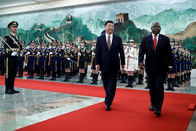 Južnoafriški predsednik Cyril Ramaphosa in kitajski predsednik Xi Jinping. FOTO: Andy Wong/Reuters