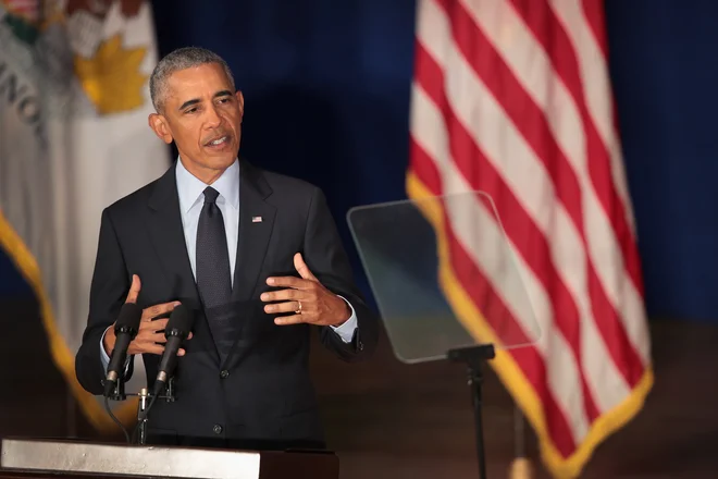 Obama je ošvrknil politike, ki izkoriščajo strahove ljudi in jih ščuvajo druge proti drugim zato, da ohranijo oblast in privilegije. FOTO: Scott Olson/Afp