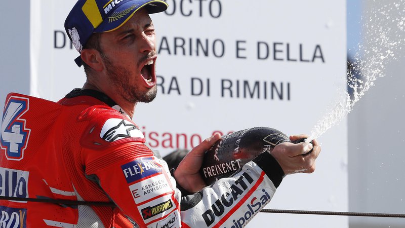 Fotografija: Italijan Andrea Dovizioso (Ducati) je zmagovalec dirke svetovnega motociklističnega prvenstva za VN San Marina v Misanu. FOTO: AP