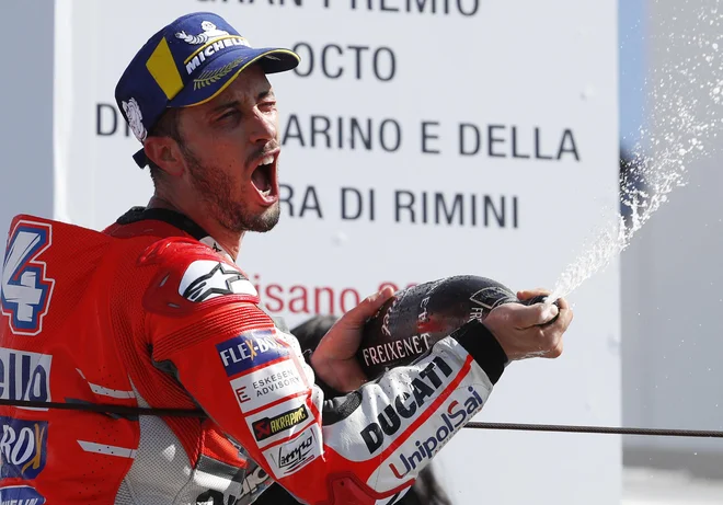 Italijan Andrea Dovizioso (Ducati) je zmagovalec dirke svetovnega motociklističnega prvenstva za VN San Marina v Misanu. FOTO: AP
