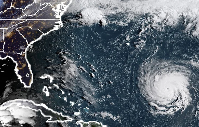 Posnetek satelita NOAA/RAMMB, na katerem je viden orkan Florence FOTO: AFP