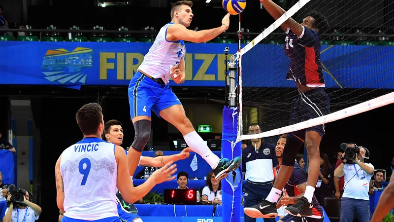 Fotografija: Jan Kozamernik je bil z naskokom najmlajši Slovenec na parketu. FOTO: FIVB