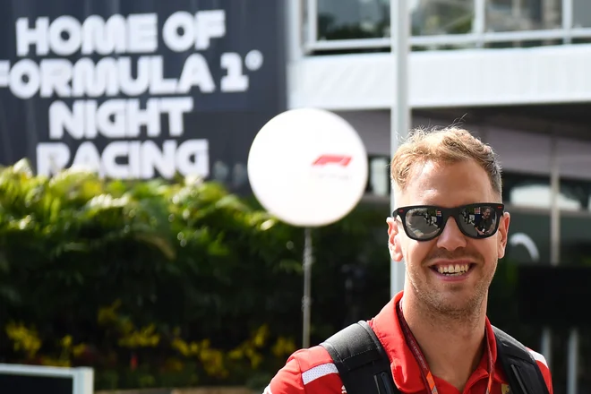 Sebastian Vettel se dobro počuti v Singapurju, kjer je zmagal že štirikrat. FOTO AFP