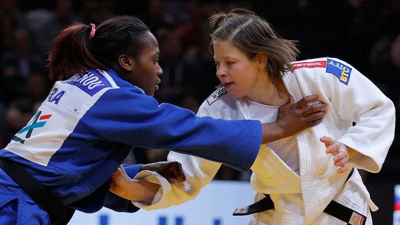 Fotografija: Tina Trstenjak in Clarisse Agbegnenou sta stari znanki s tatamijev. FOTO: Reuters