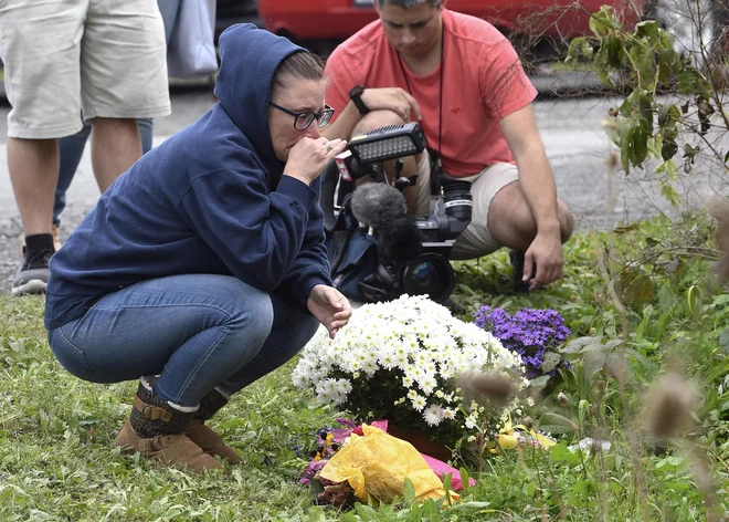 Svojci so v šoku po hudi prometni nesreči. FOTO: AP