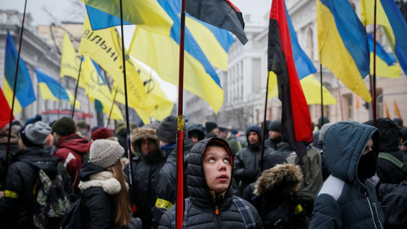 Fotografija: Shod v podporo razglasitve Rusije za agresorsko državo, ki je januarja leto potekal v Kijevu. FOTO: REUTERS/Gleb Garanich