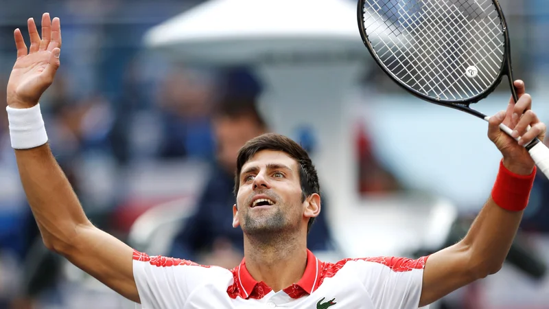 Fotografija: Novak Đoković ni v drugem nizu oddal niti igre. FOTO: Aly Song/Reuters