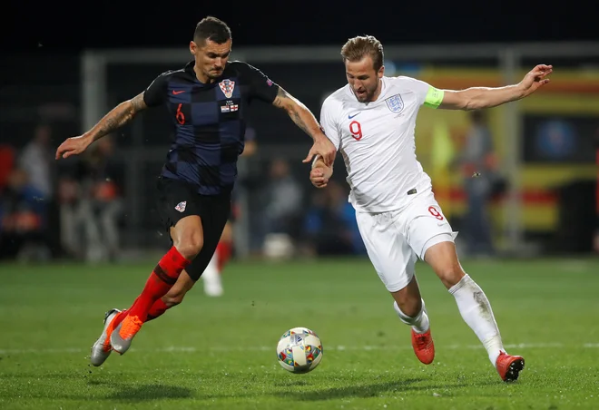 Tako hrvaški reprezentant Dejan Lovren kot angleški Harry Kane še čutita posledice napornega ritma in čustveno praznino, ki ju je prinesel mundial v Rusiji. FOTO: Carl Recine/Reuters