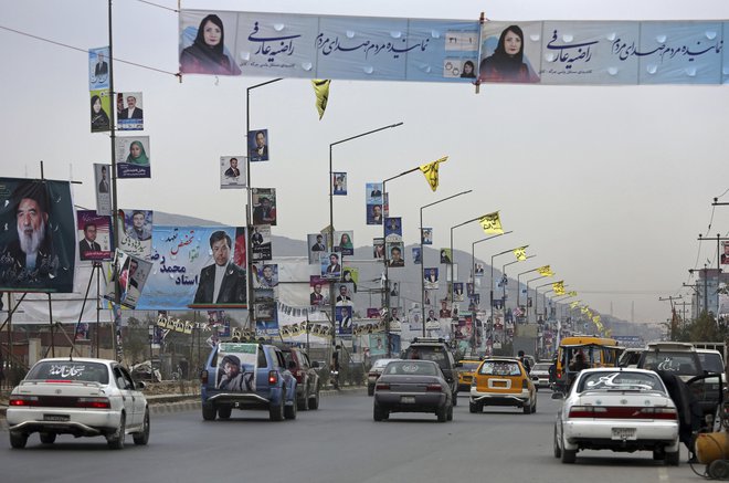 Volilna kampanja na ulicah Kabula. FOTO: AP Photo/Rahmat Gul