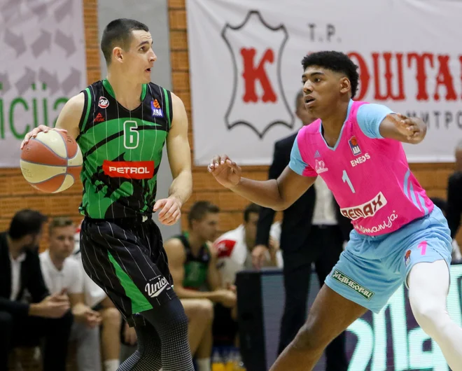 Jan Špan (levo) se je vrnil v Olimpijino moštvo, a ni preprečil poraza. FOTO: ABA