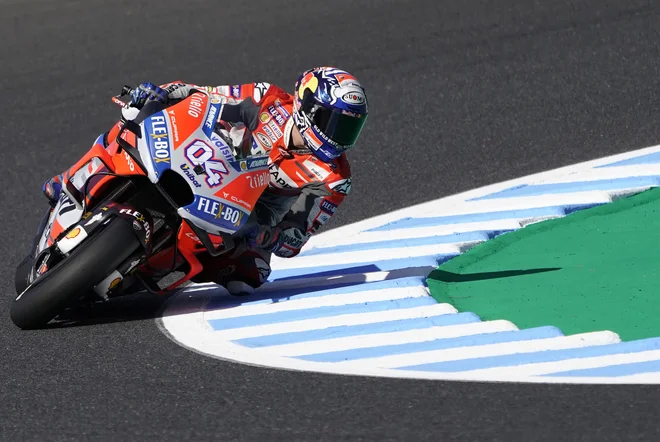 Andrea Dovizioso je napovedal, da se še namerava izločiti iz (dvo)boja za šampionsko lovoriko. FOTO: Šizuo Kambajaši/AP