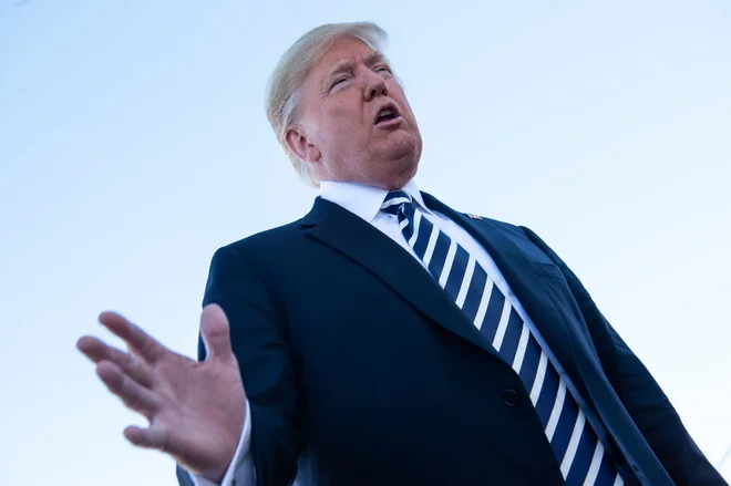 Donald Trump:&nbsp;Ne vem, zakaj že predsednik Barack Obama ni sprožil pogajanja ali izstop. FOTO: Nicholas Kamm/AFP