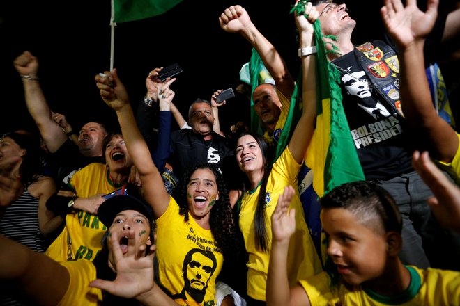 Navdušenje med Bolsonarovimi privrženci po razglasitvi njegove zmage. FOTO: REUTERS/Adriano Machado