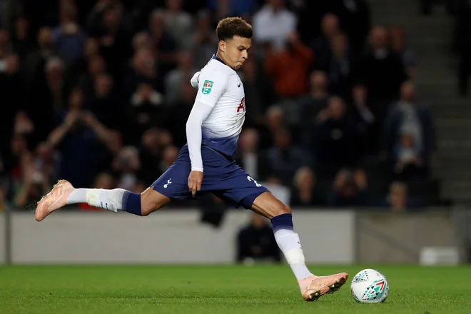 Dele Alli bo član Tottenhama še do leta 2024. FOTO: Adrian Dennis/AFP