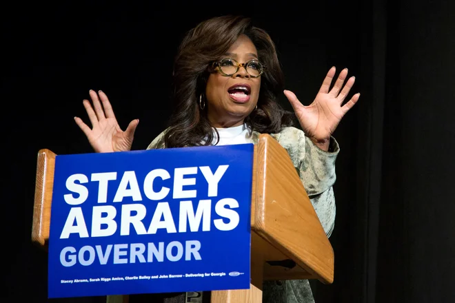 Tudi pomoč Oprah Winfrey ni pomagala Stacey Abrams, da postane prva temnoplta guvernerka Georgie. FOTO: Christopher Aluka Berry/Reuters