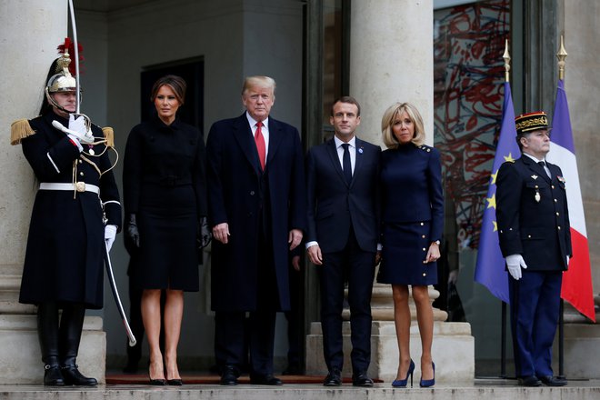Donald Trump je v Pariz prispel s svojo soprogo Melanio. FOTO: Vincent Kessler/Reuters