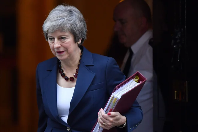 Za britansko premierko Thereso May je eden najtežjih tednov njenega mandata. FOTO: Ben STANSALL / AFP