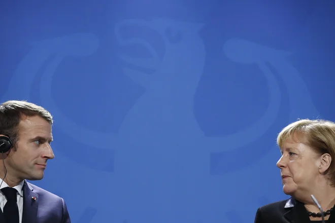Macron je na srečanju z Merklovo optimistično razmišljal o vlogi stare celine. FOTO: AFP