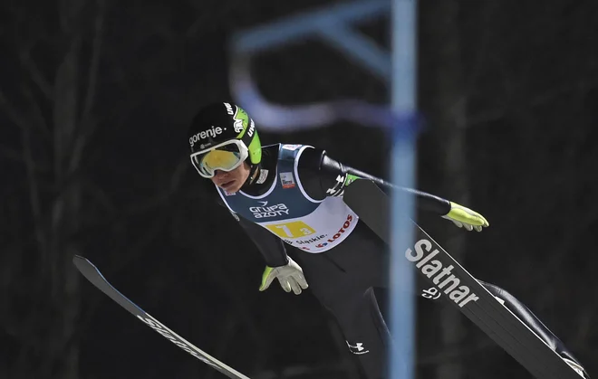Anže Lanišek se je v Visli razveselil prvih točk po Planici 2017. FOTO: AP