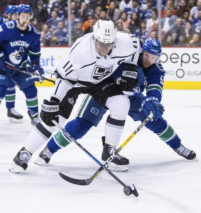 Anže Kopitar je s podajama za zadetka svojim kraljem pomagal do zmage v Vancouvru. FOTO: AP