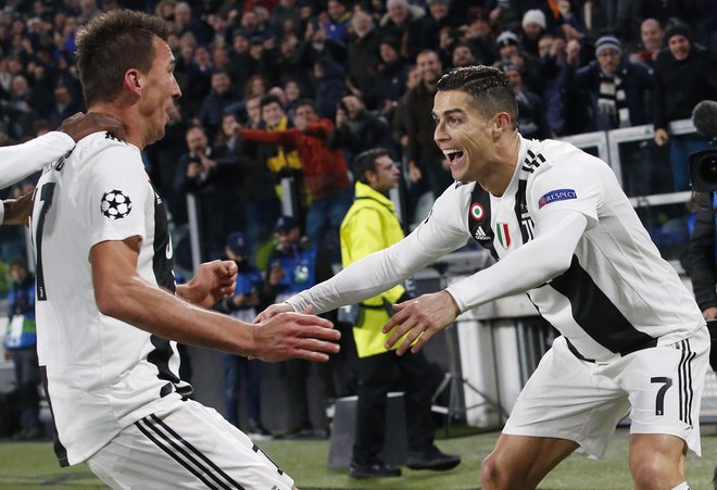Mario Mandzukić in Cristiano Ronaldo sta nazadnje potopila tudi Valencio. FOTO: AP