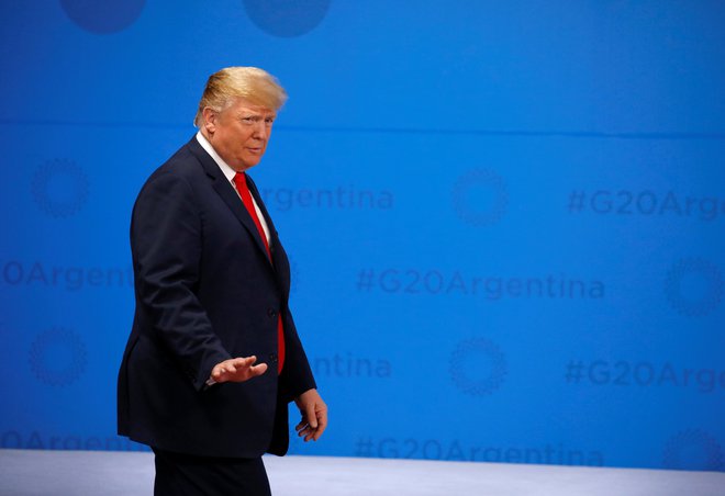 Ameriški predsednik Donald Trump ob prihodu na vrh G20 v Argentini FOTO: Reuters