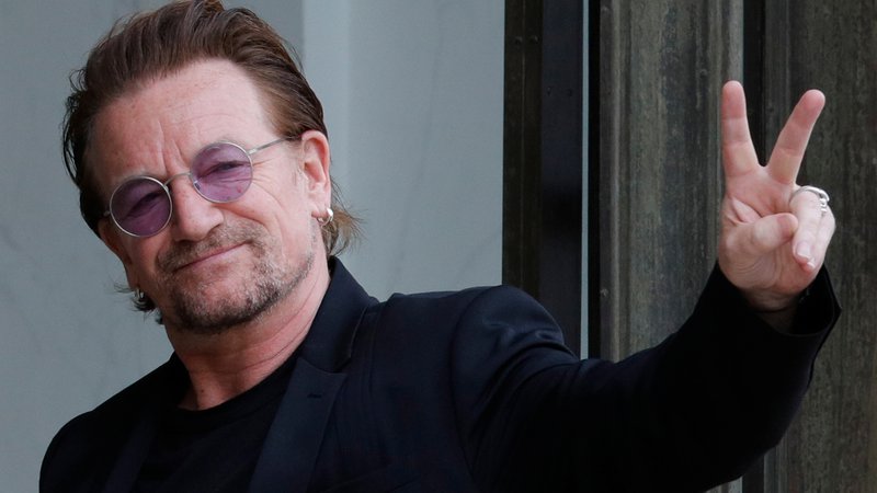 Fotografija: Bonu in zasedbi U2 je po ocenah Forbesa prvo mesto med zaslužkarji v glasbeni industriji prinesel izkupiček s koncertov. FOTO: Philippe Wojazer/Reuters