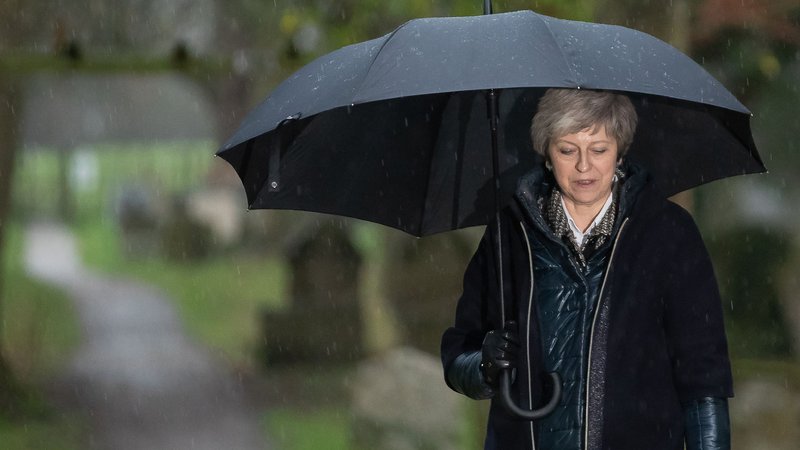 Fotografija: Britanski premierki Theresi May ni uspelo prepričati zadostnega števila poslancev, da bi potrdili njen ločitveni dogovor z EU. FOTO: Daniel LEAL-OLIVAS / AFP