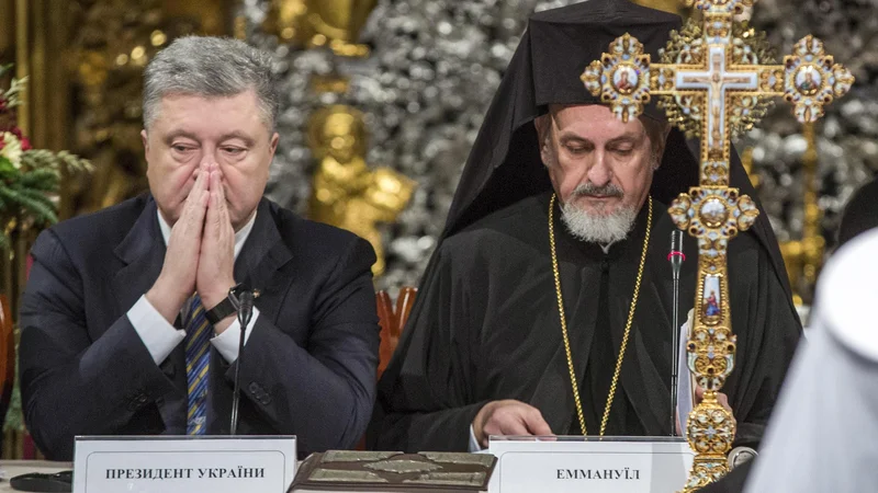 Fotografija: Novoustanovljena ukrajinska cerkev je državotvorni religiozni projekt ukrajinskega predsednika Petra Porošenka. Foto: AP
