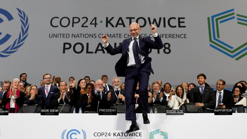 Fotografija: Predsedujoči COP24 Michal Kurtyka je navdušen nad rezultatom. FOTO: Kacper Pempel/Reuters