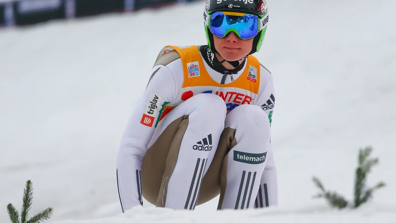 Fotografija: Domen Prevc je pred dvema sezonama novoletno turnejo začel (in tudi končal) v rumeni majici vodilnega v skupnem seštevku svetovnega pokala. FOTO: Reuters