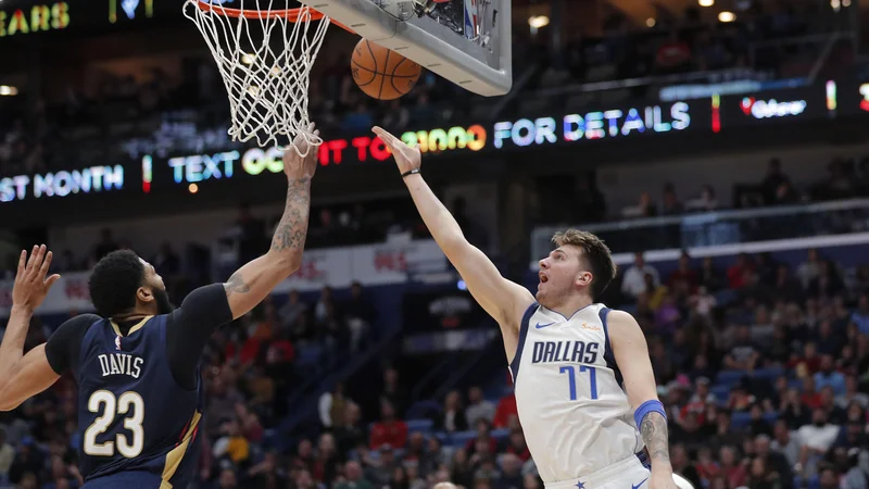 Fotografija: Luka Dončić je v enem večeru potolkel dva rekorda. FOTO: Gerald Herbert/AP