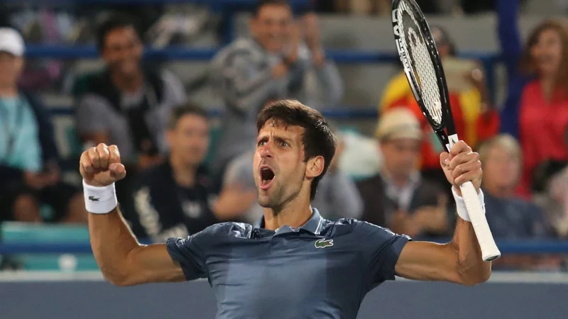 Fotografija: Novak Đoković je izjemno uspešno koledarsko leto zapečatil z zmago. FOTO: Suhaib Salem/Reuters
