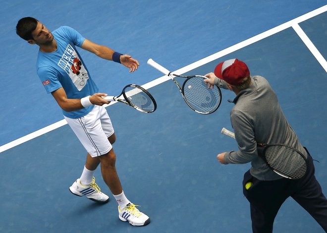 Nemec (desno) z Novakom Đokovićem več ne sodeluje, pravi pa, da je brez dvoma prvi favorit OP Avstralije. FOTO: Reuters