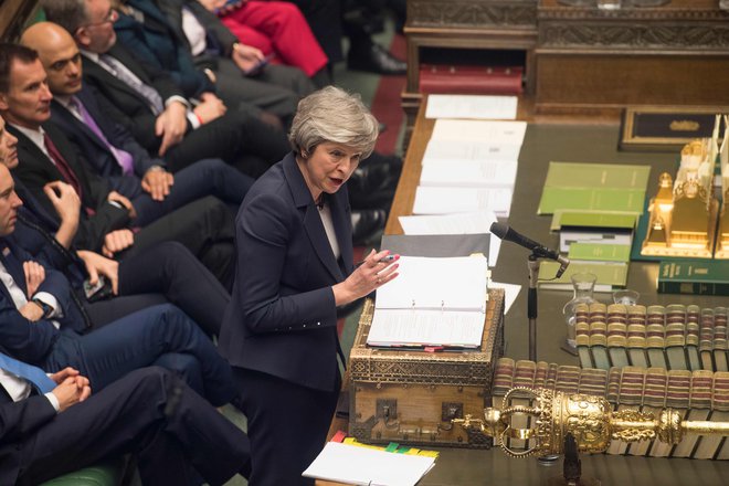 Britanska premierka je v zadnjih dneh večkrat opozorila poslance pred posledicami zavrnitve ločitvenega sporazuma. FOTO: Mark Duffy/AFP PHOTO