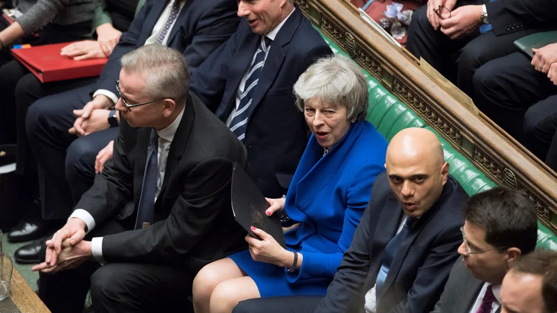 Fotografija: Britanska premierka med razpravo o nezaupnici. FOTO: Jessica Taylor/ REUTERS