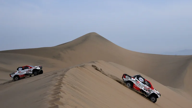 Fotografija: Nasser al-Attiyah je bil prehiter tudi za Sebastiena Loeba. FOTO: Franck Fife/AFP