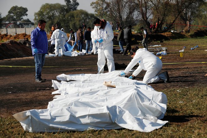 Število smrtnih žrtev ekspolzije naraslo na najmanj 79. FOTO: Henry Romero/Reuters