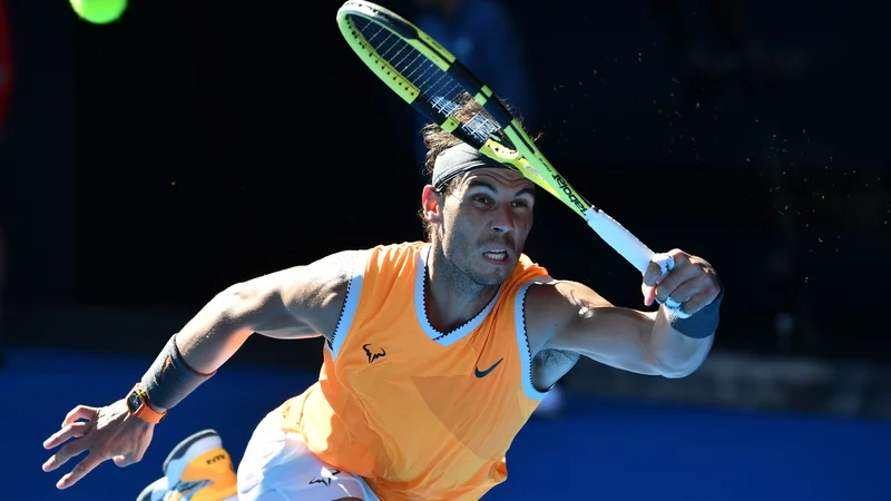 Fotografija: Rafael Nadal se je dobro preznojil šele v tretjem nizu. FOTO: Saeed Khan/AFP