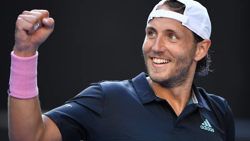 Fotografija: Lucas Pouille je z uvrstitvjo v polfinale prekosil svoja najboljša dosežka na velikih slamih, četrfinale v Parizu in Wimbledonu. FOTO: AFP