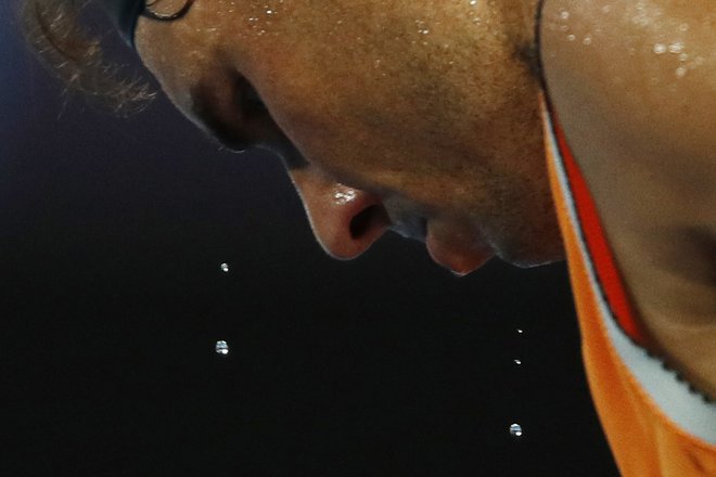 Rafael Nadal si je v hudi vročini priigral nastop v finalu. FOTO: Edgar Su/Reuters