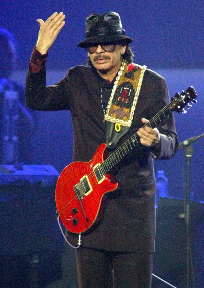 Carlos Santana je edini, ki je nastopal na prvem Woodstocku in je tudi potrdil svojo udeležbo na jubilejnem. Odločil se je za dogodek, ki ga pripravlja Umetniški center Bethel Woods v sodelovanju z Live Nation. FOTO: Steve Marcus/Reuters