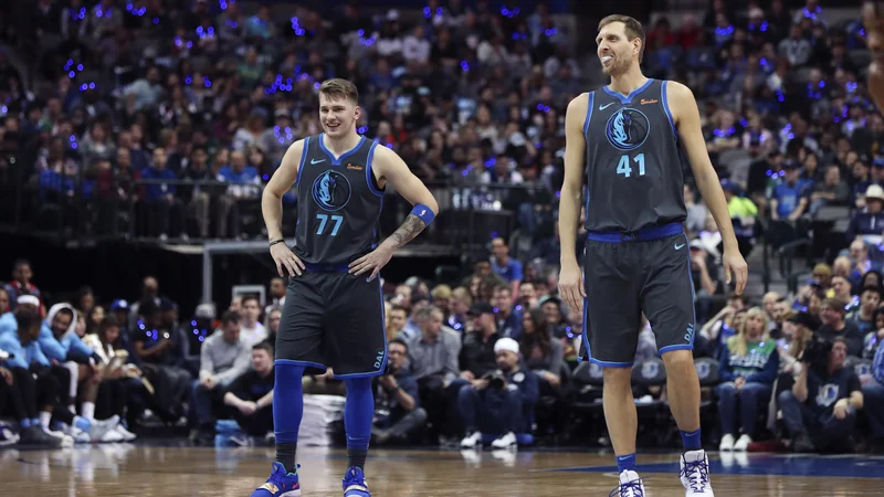 Fotografija: Dončić in Nowitzki se bosta družila tudi v Charlottu. FOTO: Reuters
