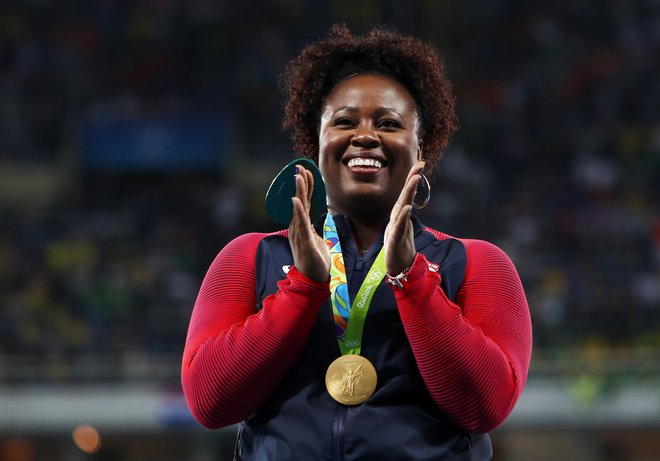 RIO DE JANEIRO, BRAZIL - AUGUST 13:  Gold medalist Michelle Carter of the United States celebrates on the podium during the medal ceremony for the  Women's Shot Put
on Day 8 of the Rio 2016 Olympic Games at the Olympic Stadium on August 13, 2016 in Rio de