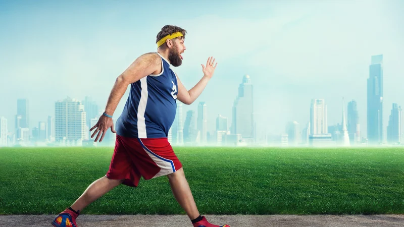 Fotografija: Fat sportsman running in the open air