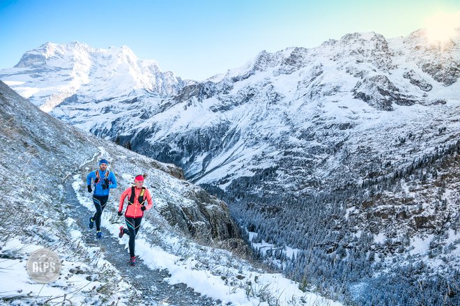 Trail running in early winter conditions above Lauterbrunnen Valley, Switzerland