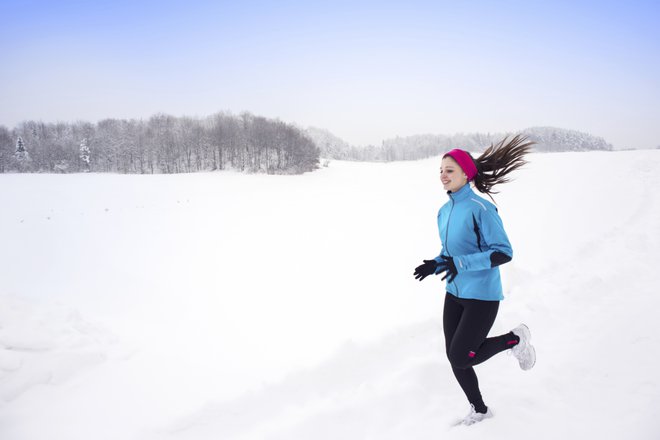 Winter running woman