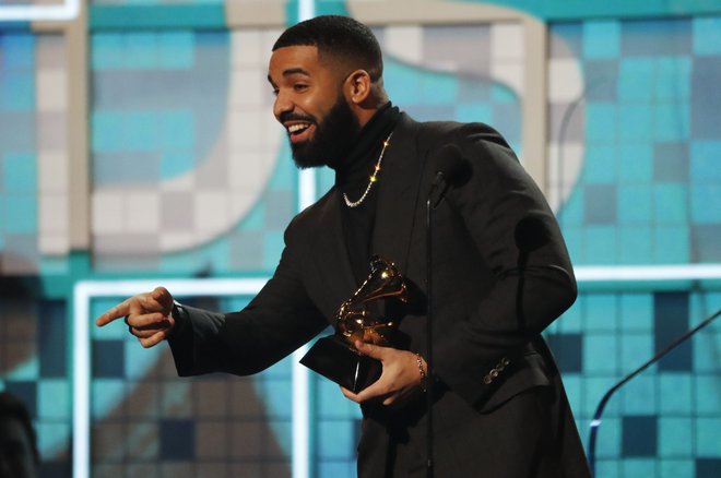Drake je bil kritičen do samega podeljevanja nagrad v glasbenem svetu, njegov govor pa so prekinili. FOTO: Mike Blake/Reuters