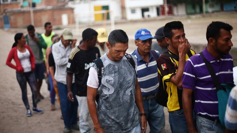 Fotografija: Venezuelo je v zadnjih petih letih zapustilo več kot dva milijona ljudi. Na fotografiji migranti v Cucuti, mestu na meji med Venezuelo in Kolumbijo. FOTO: Edgard Garrido/Reuters