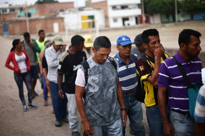 Venezuelo je v zadnjih petih letih zapustilo več kot dva milijona ljudi. Na fotografiji migranti v Cucuti, mestu na meji med Venezuelo in Kolumbijo. FOTO: Edgard Garrido/Reuters